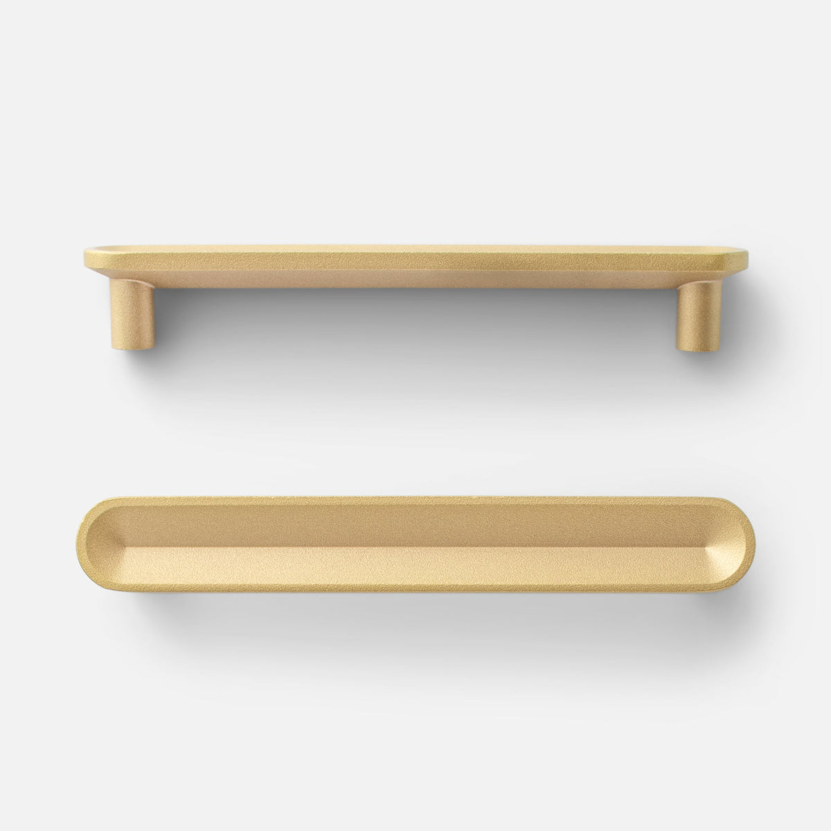 Front and underside views of Rhone pull showcasing cast brass finish with a white background