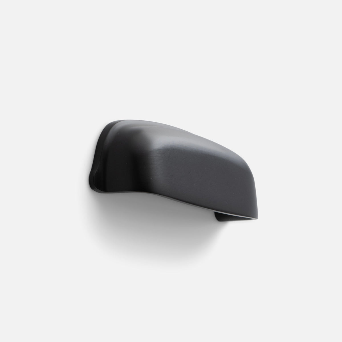 Close-up side view of the Darby Cup Pull showcasing its gently curved silhouette with a white background