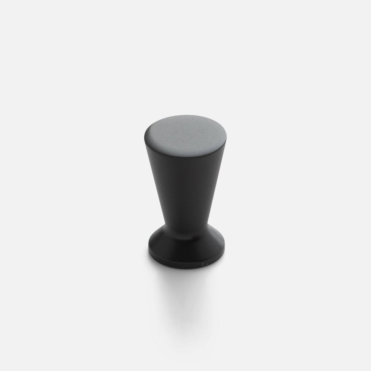 Front view of the Radcliffe Knob showcasing its True Black finish and tapered profile with a white background