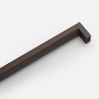 Close-up view of Edgecliff Appliance Pull showcasing its angular squared ends and cylindrical grip on a white background