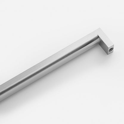 Angled close-up of Edgecliff appliance pull showcasing its brushed finish and square ends on a white background