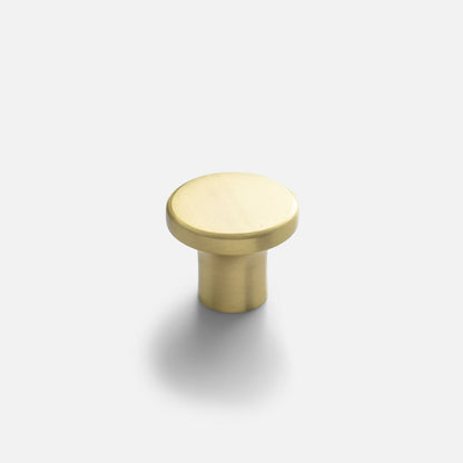 Angled view of Roland Cabinet Knob showcasing solid-brass construction on a light gray background