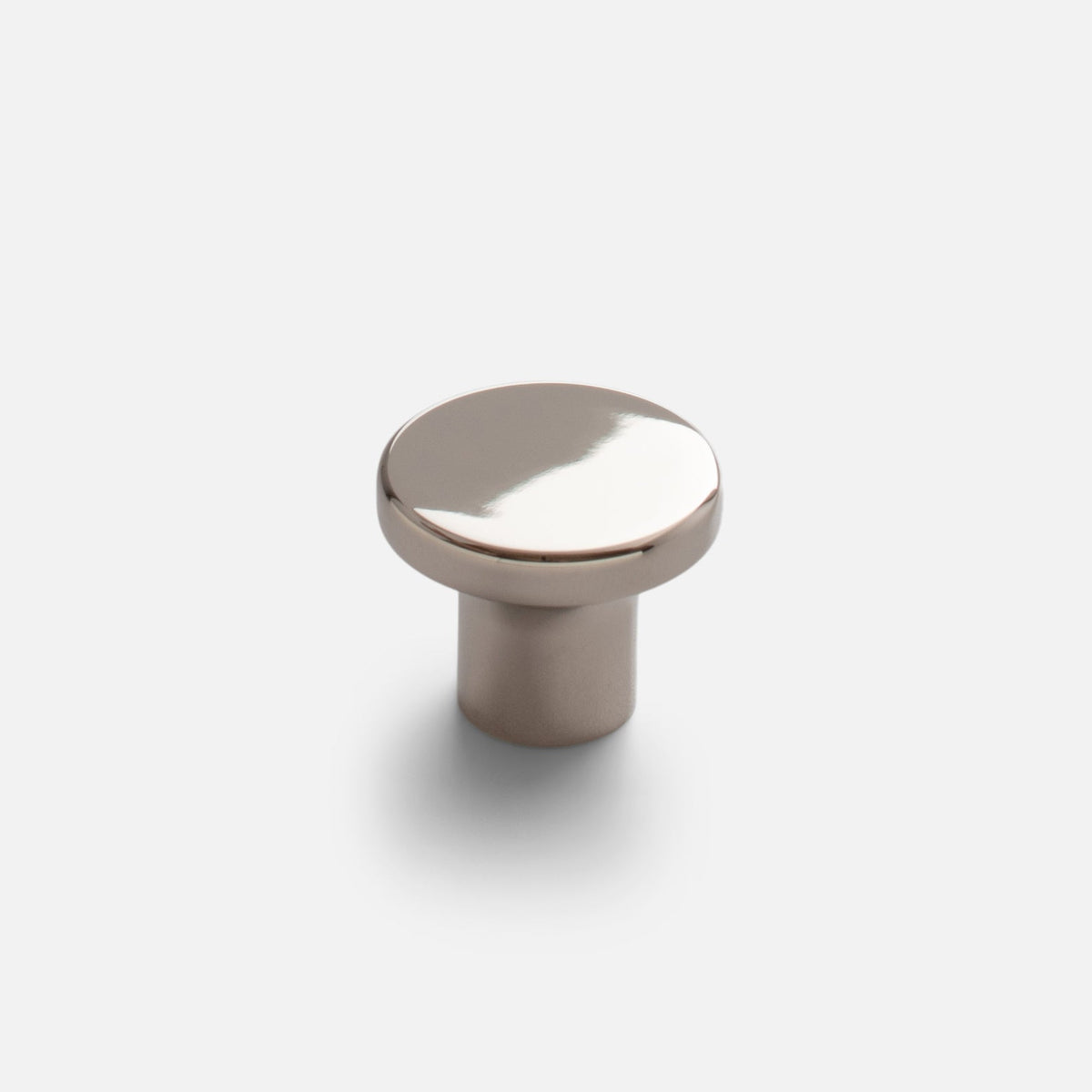 Close-up front view of the polished nickel Roland cabinet knob showcasing its round cap and cylindrical base on a white background