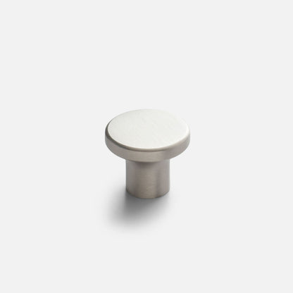 Close-up front view of the Roland Cabinet Knob showcasing its round satin nickel finish and cylindrical base on a white background