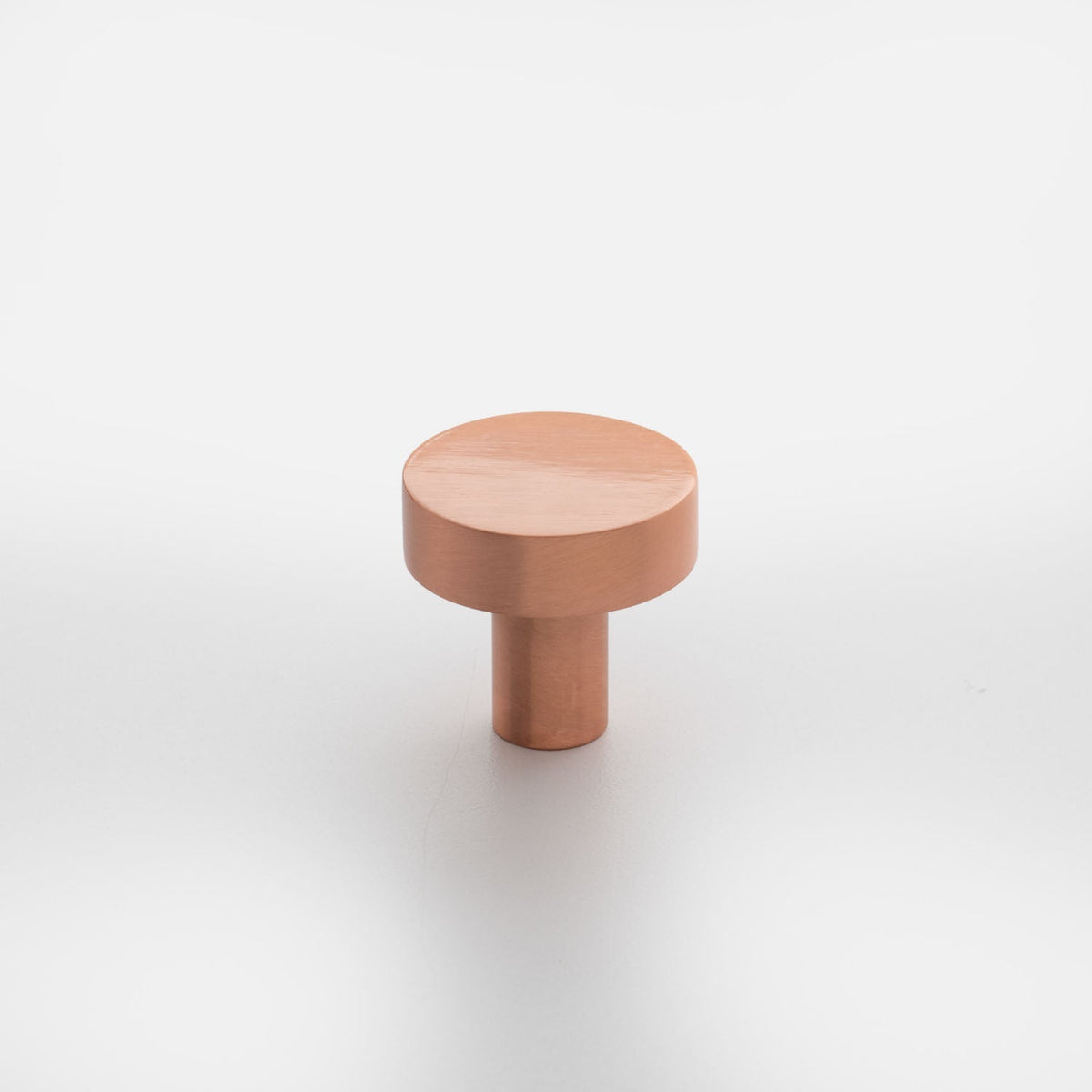 Front view of Edgecliff Knob showcasing its round cylindrical design with a white background