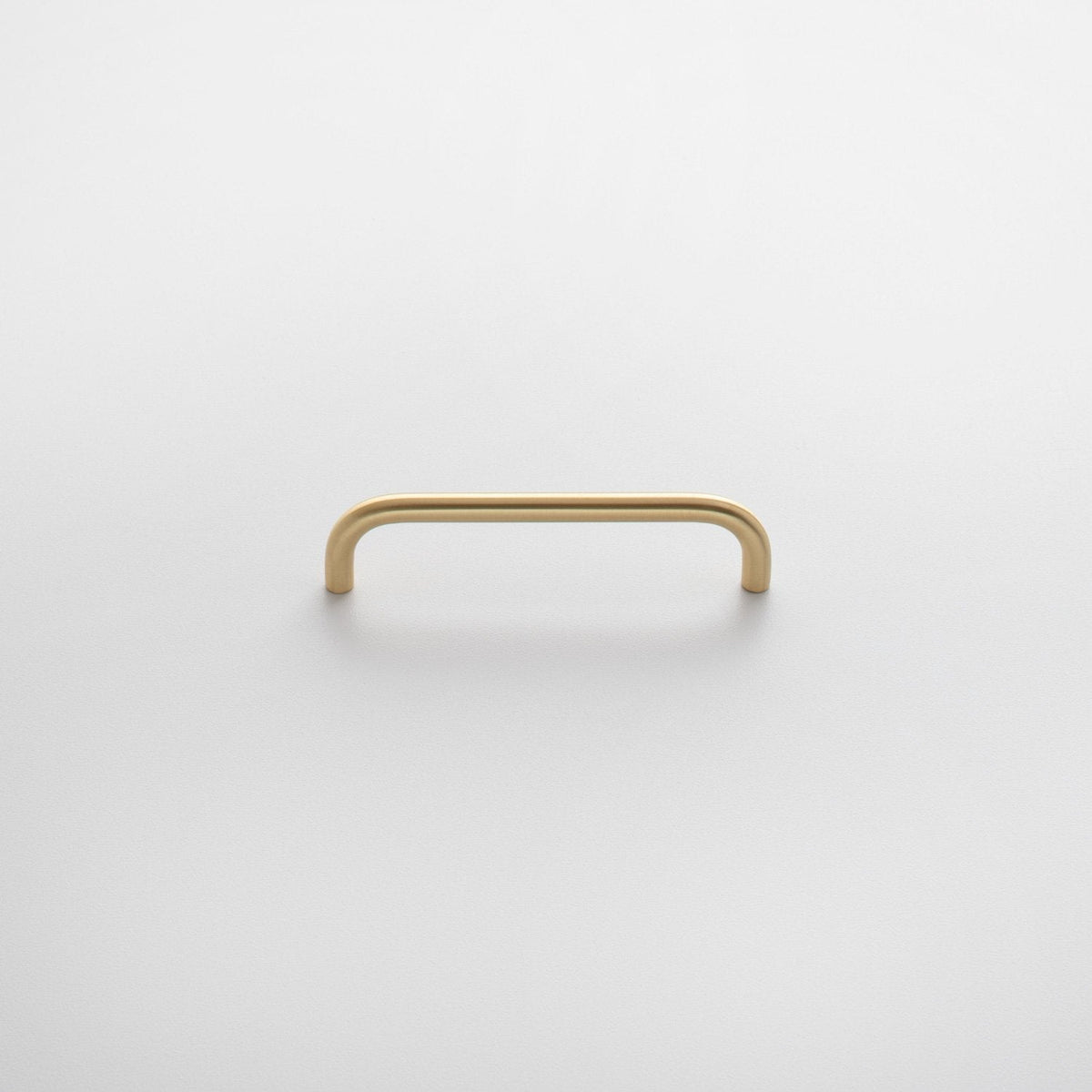Front view of Parker Pull showcasing its rounded rectangular bar design with a light gray background