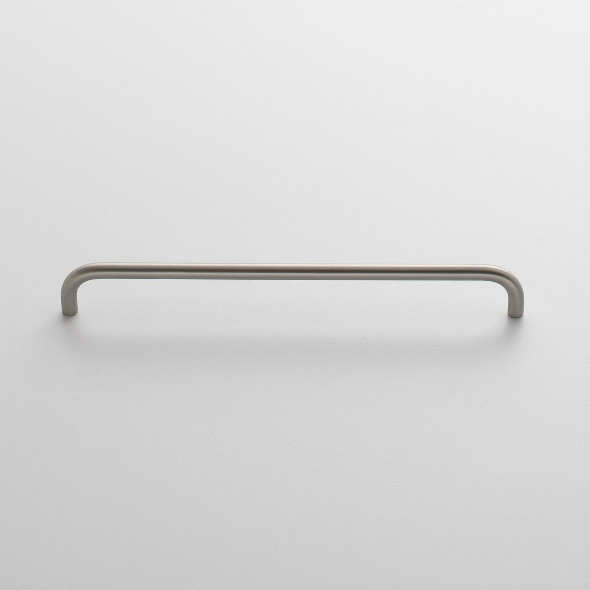 Front view of Parker Pull showcasing its long rounded bar design against a light background