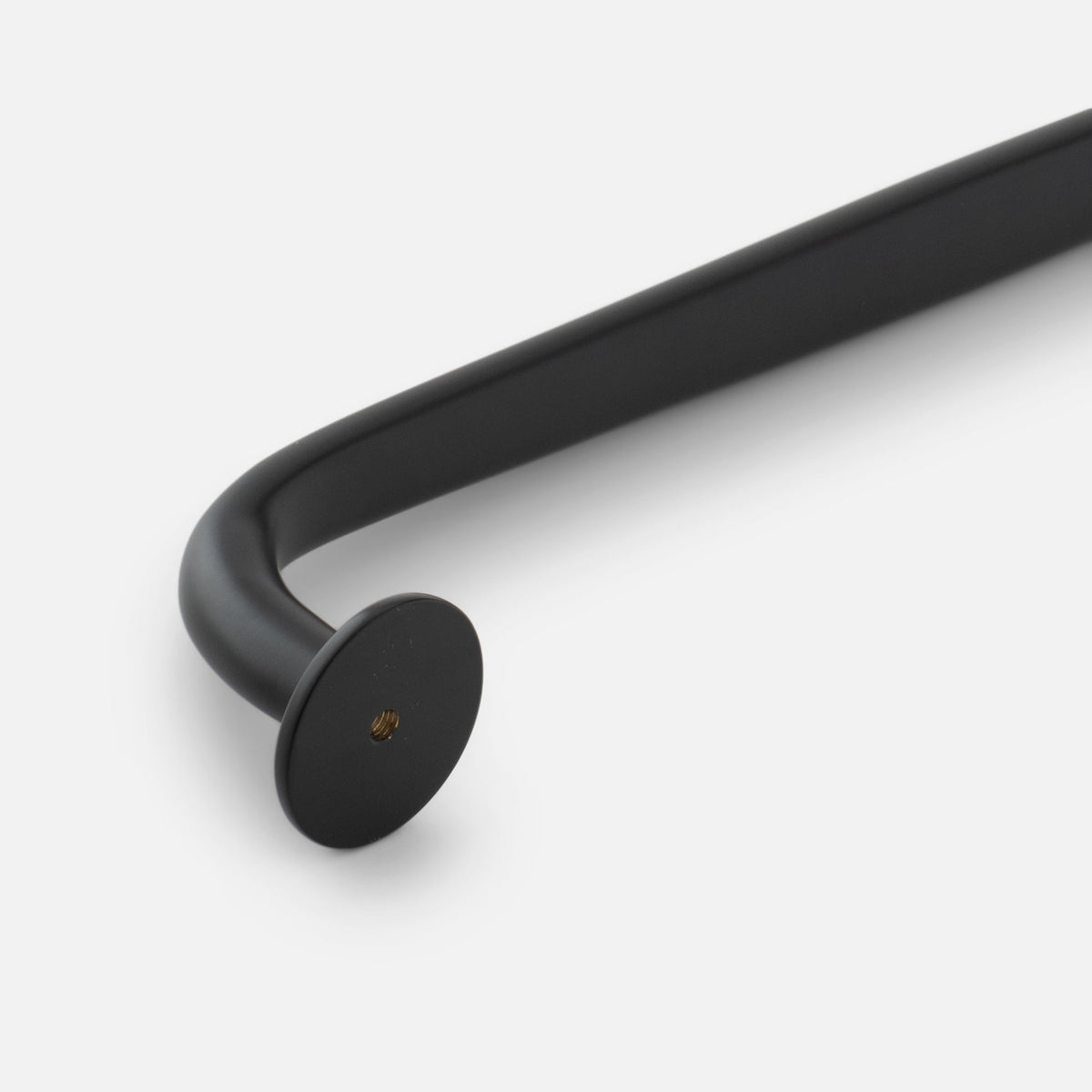 Close-up view of Somerset appliance pull showcasing its rounded bar and circular mounting base on a white background