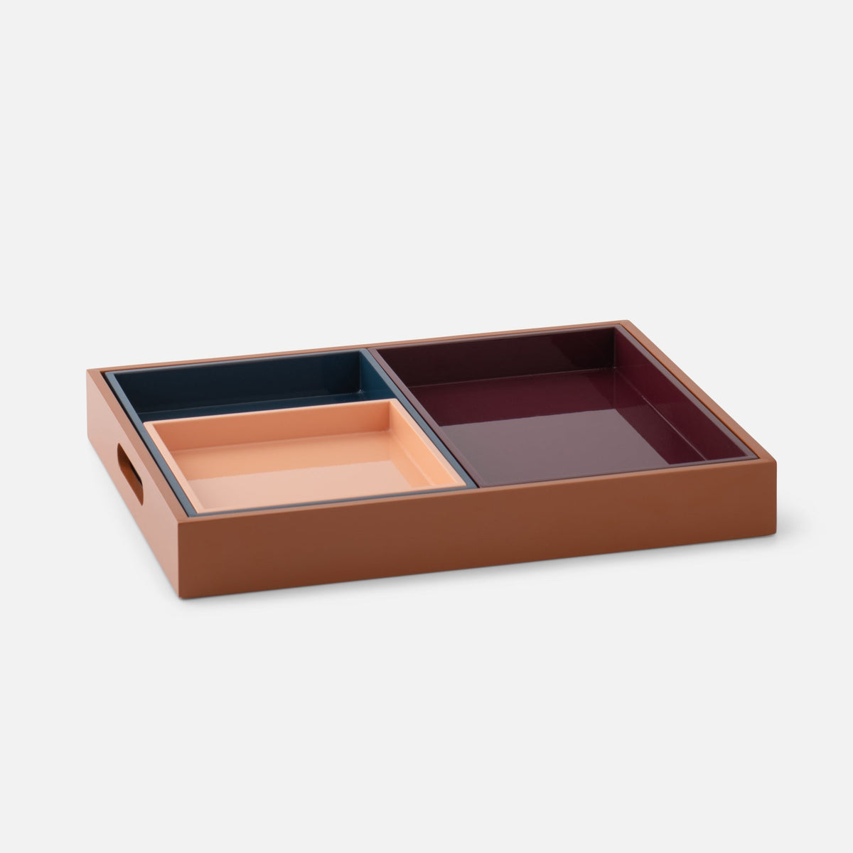 Angled view of Stacking Trays, Set of 4 showcasing nesting design and muted multicolor lacquer finish on white background