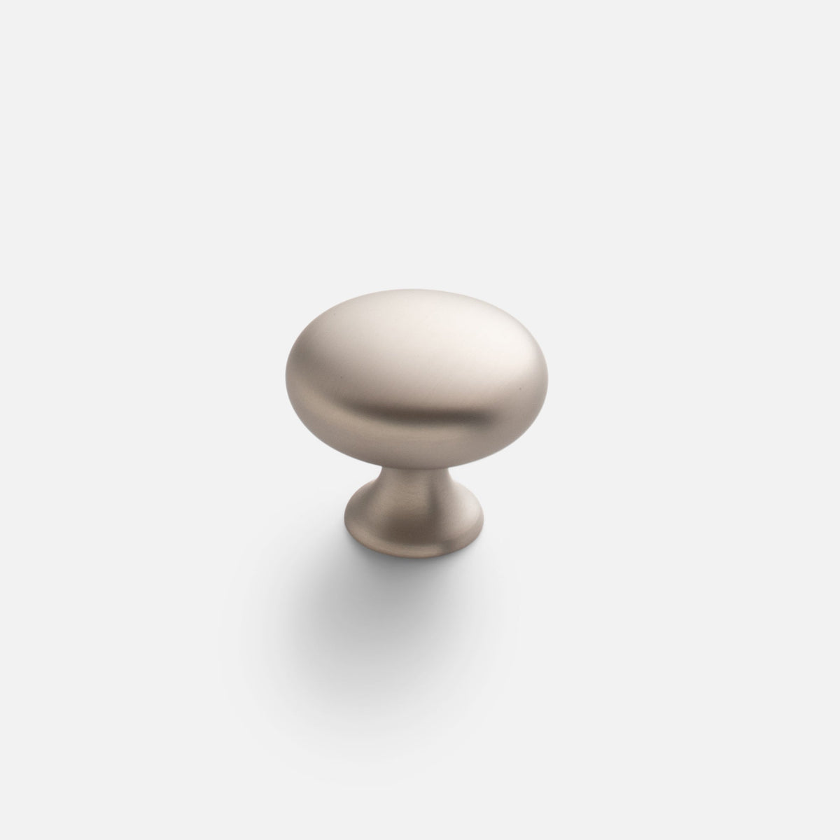 Front view of Somerset Knob showcasing its egg-shaped silhouette and solid brass construction with a plain light background