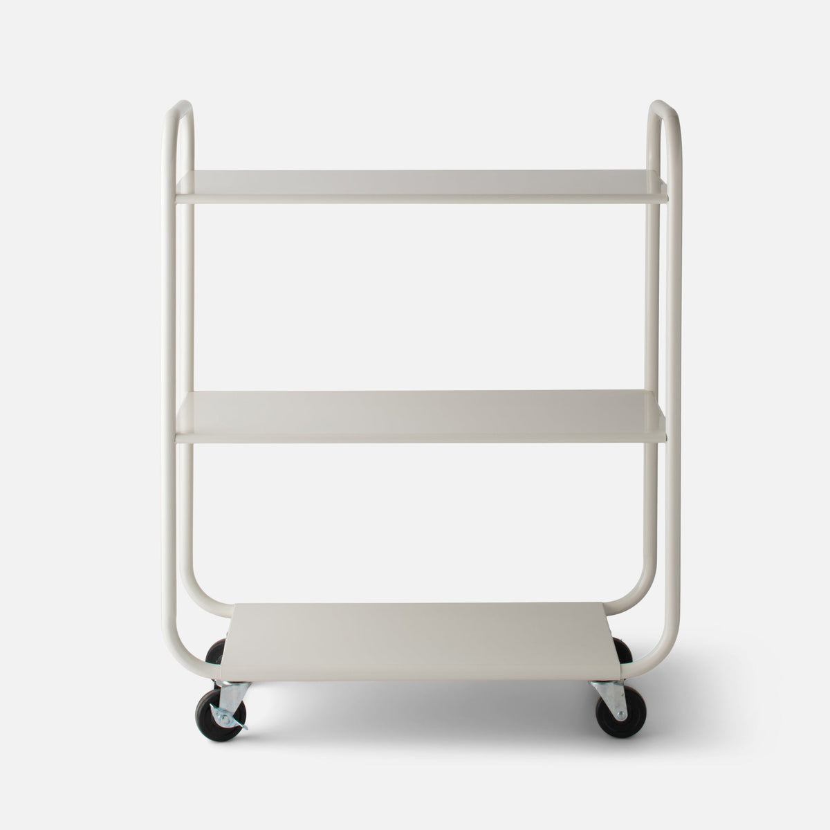 Front view of Miller Storage Cart showcasing three shelves and caster wheels in Shell White gloss on white background