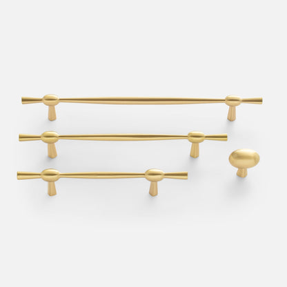 Front view of Eleanor Pull in natural brass showcasing curved bow tie design in multiple sizes on white background