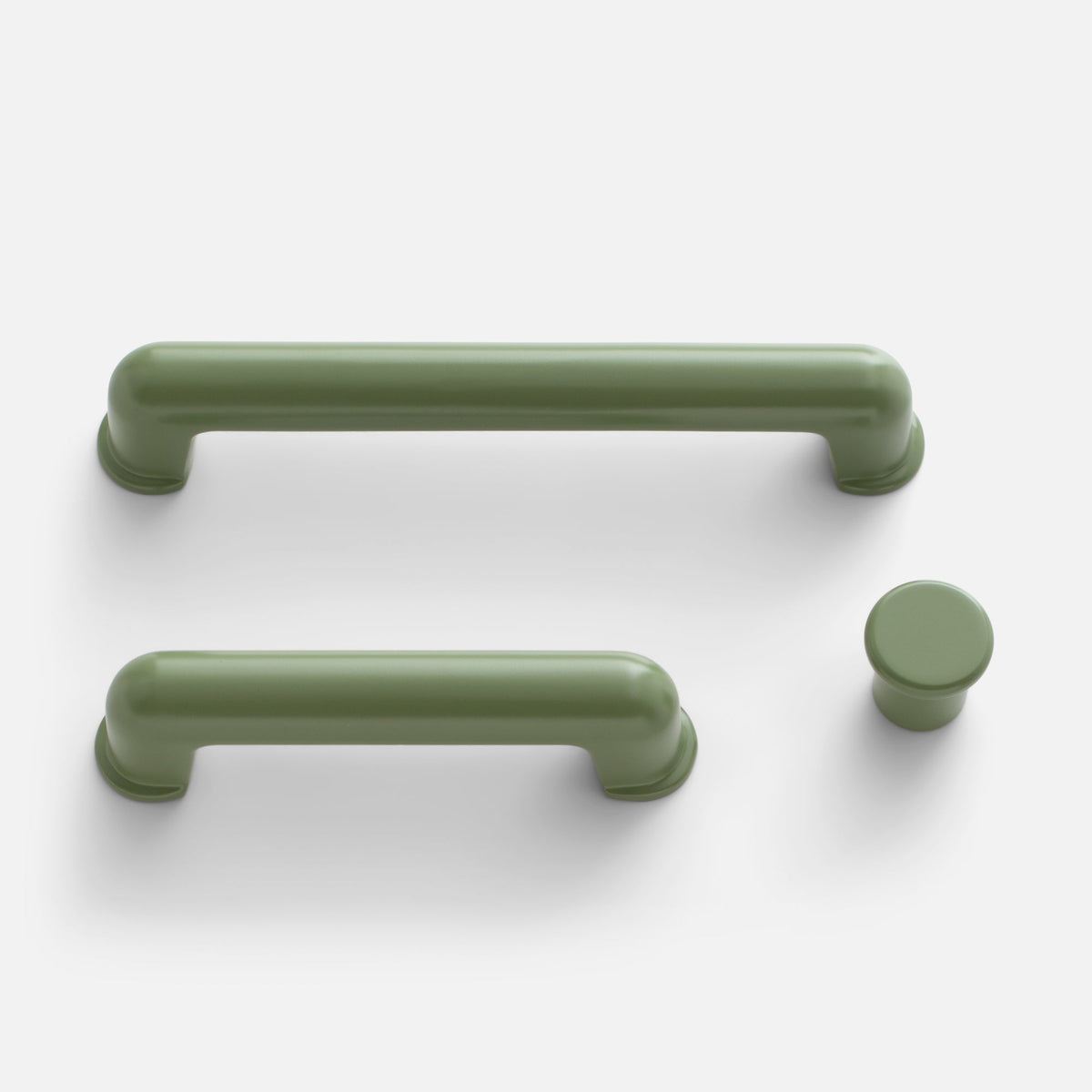 Top view of Remy Knob showcasing rounded pull handles and matching knob on a white background