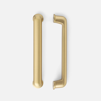 Front view of Remy Pull showcasing two long gold-toned cabinet pulls on a light gray background