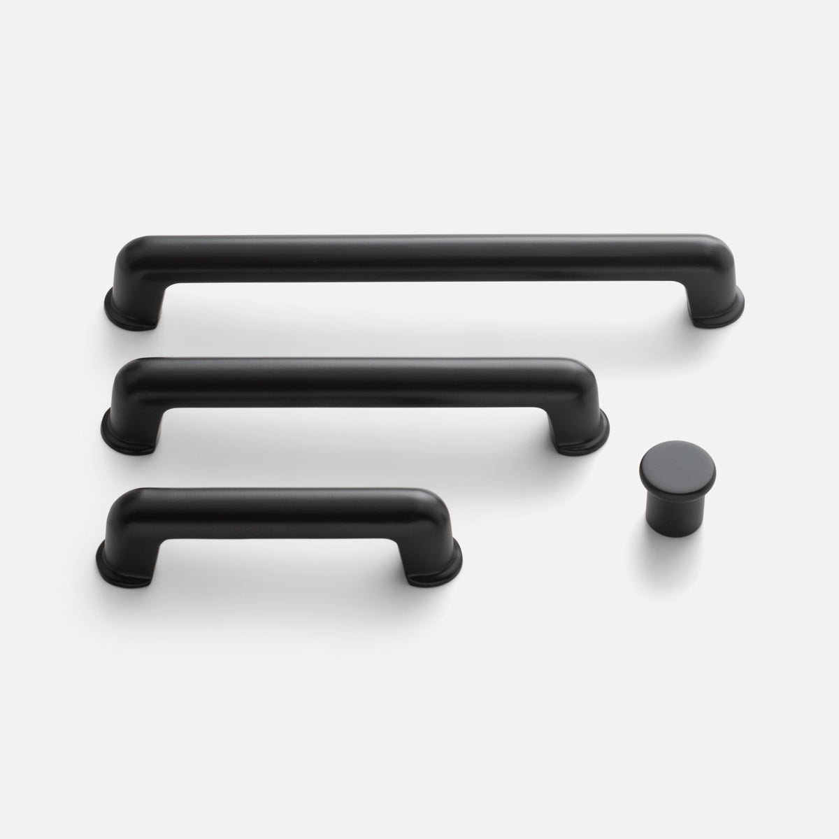Front view of Remy Knob showcasing rounded pull handles and a matching knob with a white background