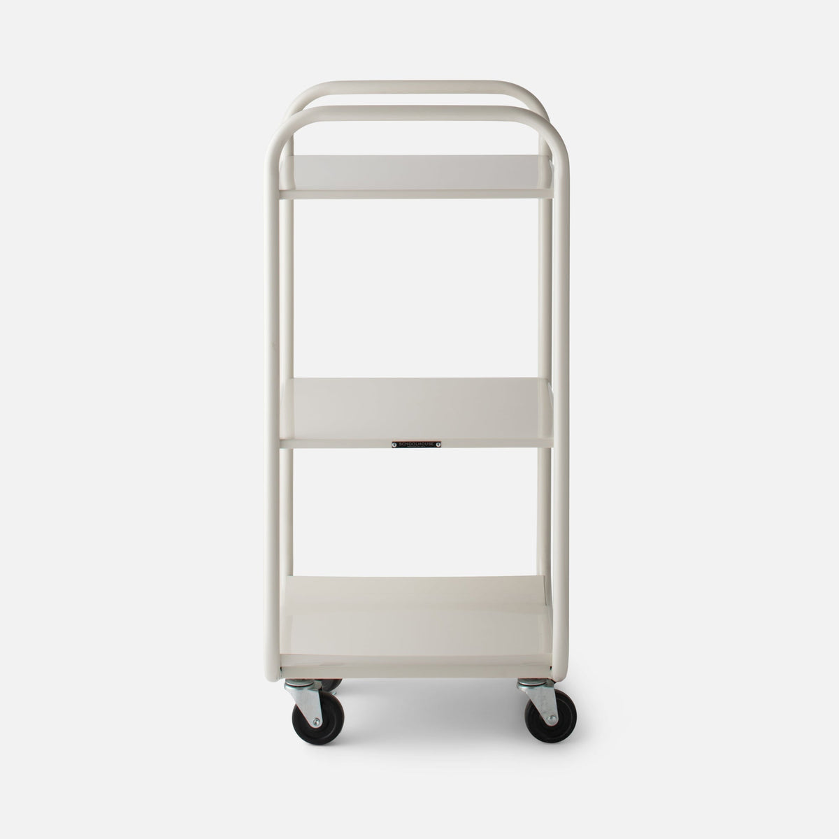 Front view of Miller Storage Cart showing three white metal shelves, rounded tubular handles and caster wheels on a plain studio background