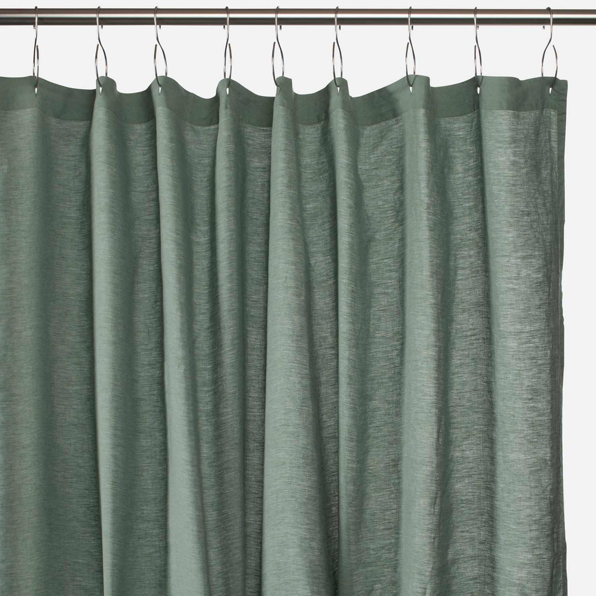 Front view of Laurel 100% linen shower curtain showcasing textured fabric and hanging loops against a white background