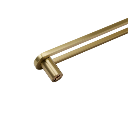 Close-up of the Landon Pull showcasing its cylindrical brass hardware and dual bar design on a white background