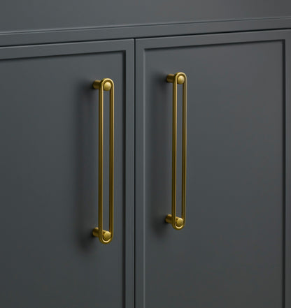 Front view of Landon Pull showcasing its vertical bar design on dark gray cabinet doors
