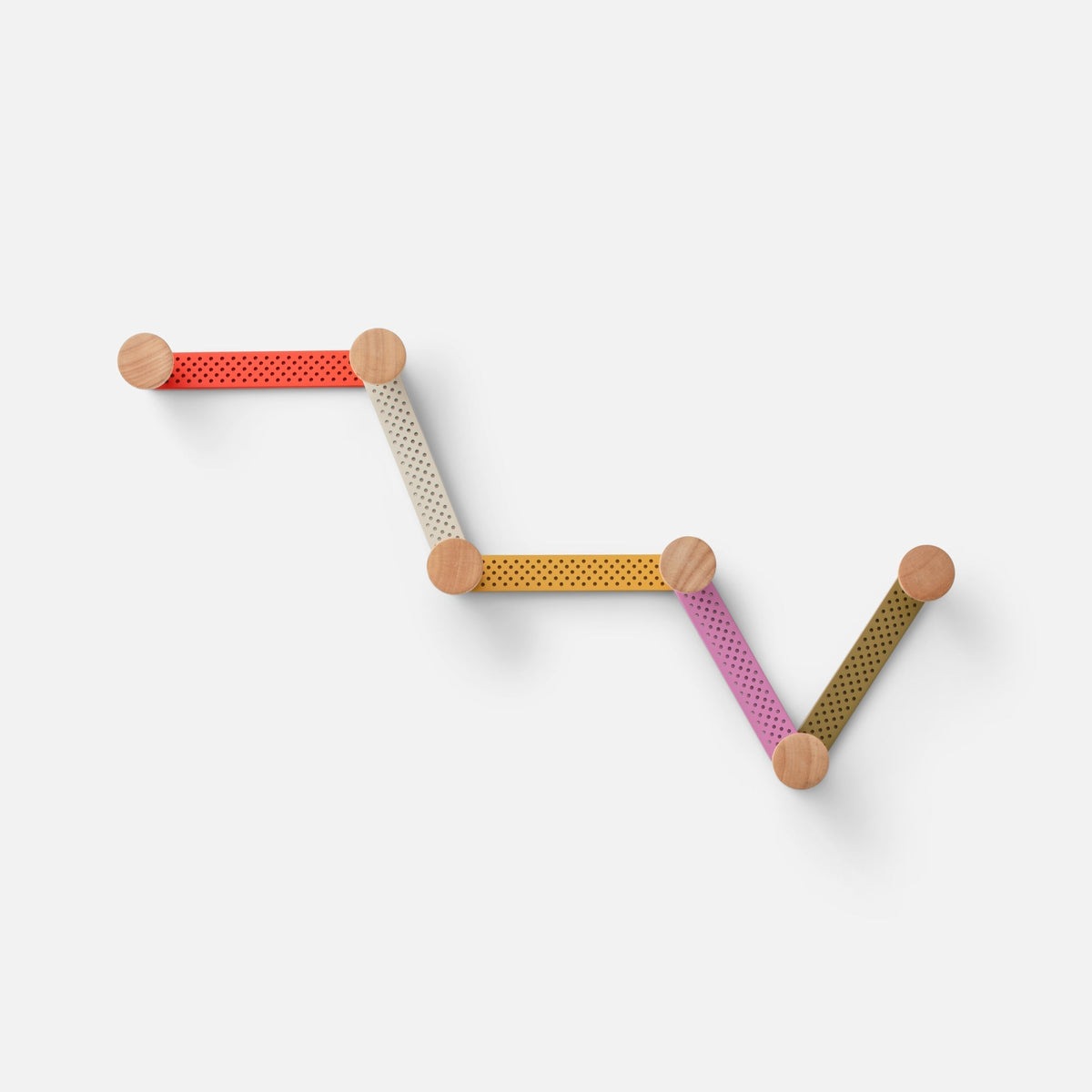 Overhead view of Tula Hook showcasing multicolor perforated aluminum sections and natural wood finials on a white background