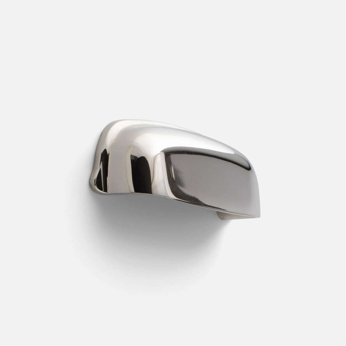 Angled view of the Darby Cup Pull showcasing its polished nickel finish and gently curved silhouette on a white background