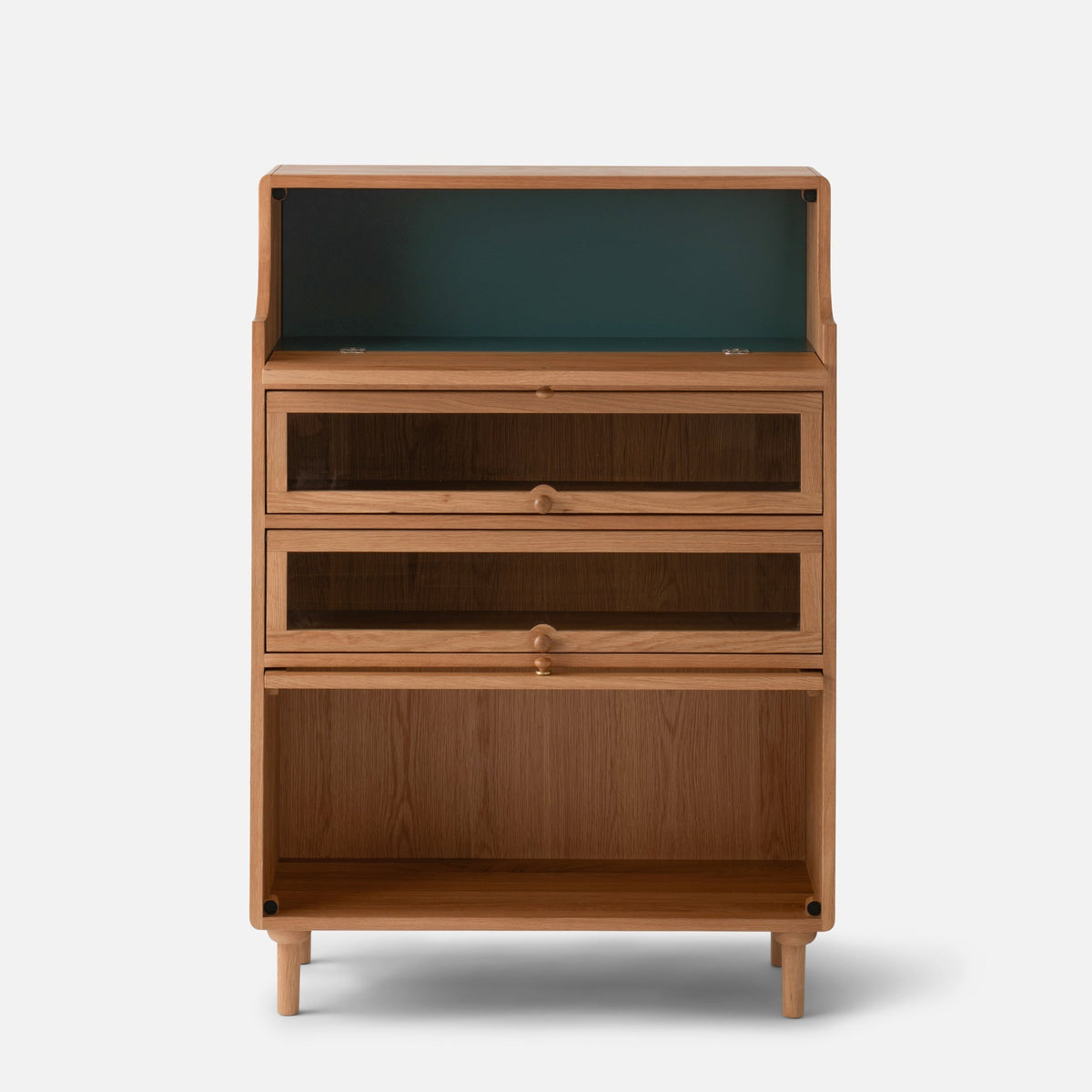 Front view of Peggy Cabinet showcasing an open upper shelf, two drawers, and a lower storage compartment against a light background