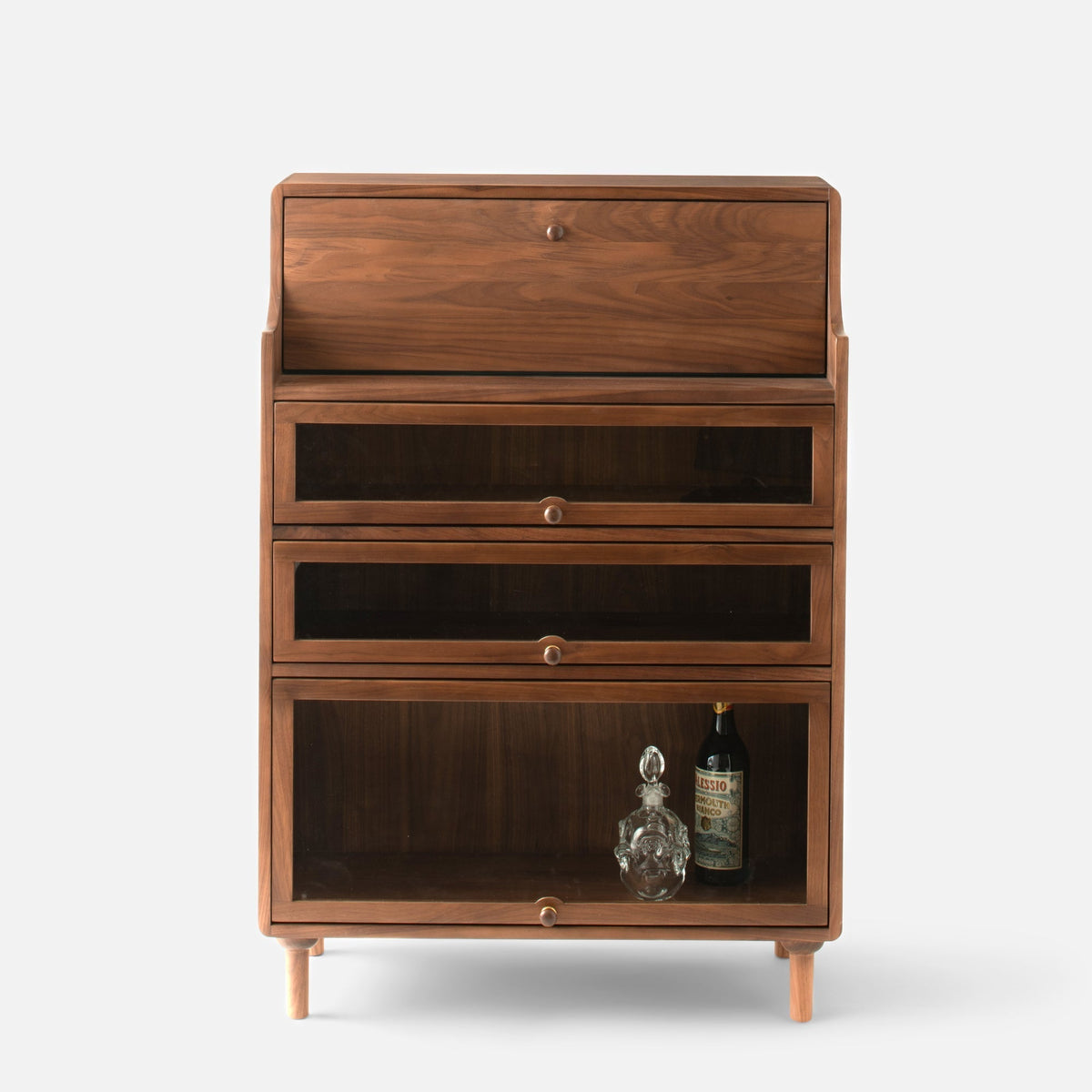 Front view of the Peggy Cabinet showcasing one drawer and two glass-front doors with a white background