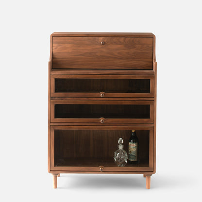 Front view of the Peggy Cabinet showcasing one drawer and two glass-front doors with a white background