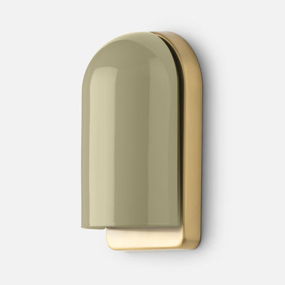 Close-up of Allegheny Slim Sconce in olive green showing glossy rounded shade and brushed brass backplate on white background
